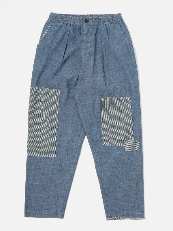 universal-works-patched-pleated-track-pant-in-indigo-chambray-hickory