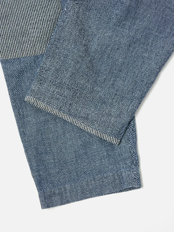 universal-works-patched-pleated-track-pant-in-indigo-chambray-hickory