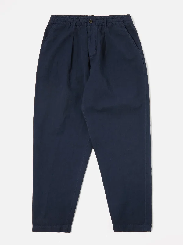 universal-works-pleated-track-pant-in-navy-linen-slub-weave