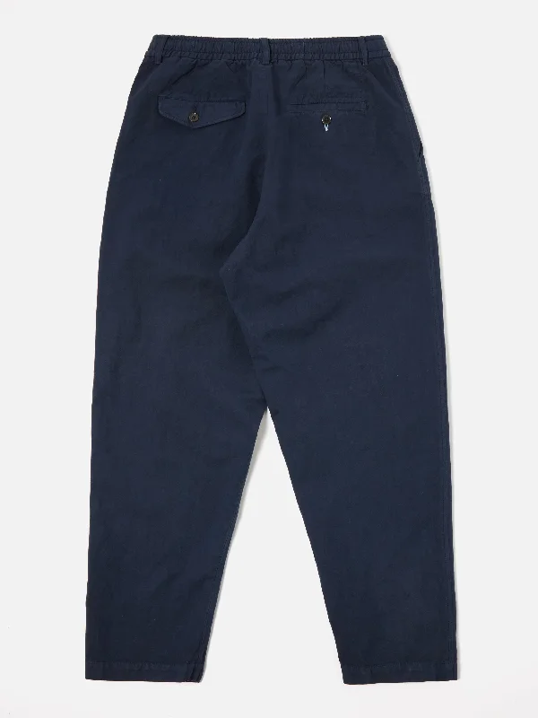 universal-works-pleated-track-pant-in-navy-linen-slub-weave