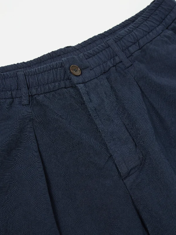 universal-works-pleated-track-pant-in-navy-linen-slub-weave