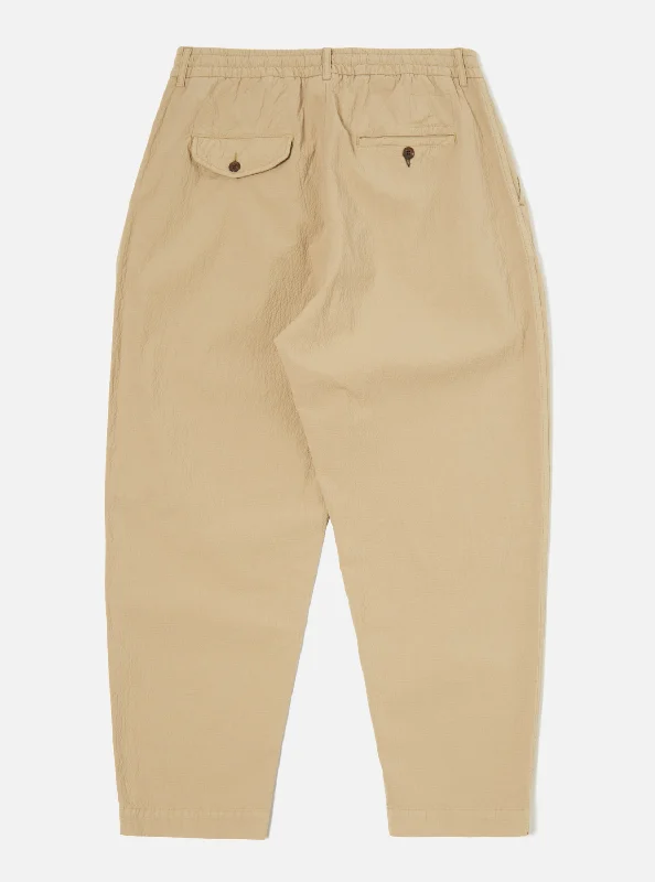 universal-works-pleated-track-pant-in-summer-oak-seersucker-ll