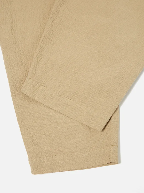 universal-works-pleated-track-pant-in-summer-oak-seersucker-ll